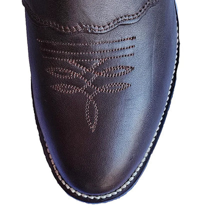 Retanned hide cowboy boot with a firm 14-inch shaft