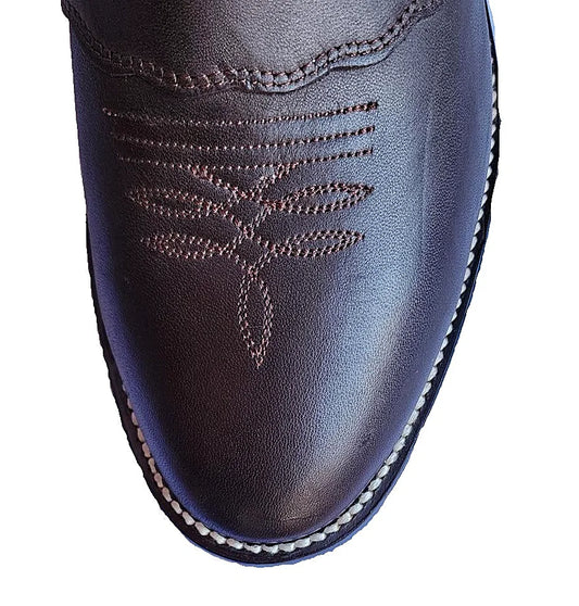 Retanned hide cowboy boot with a firm 14-inch shaft