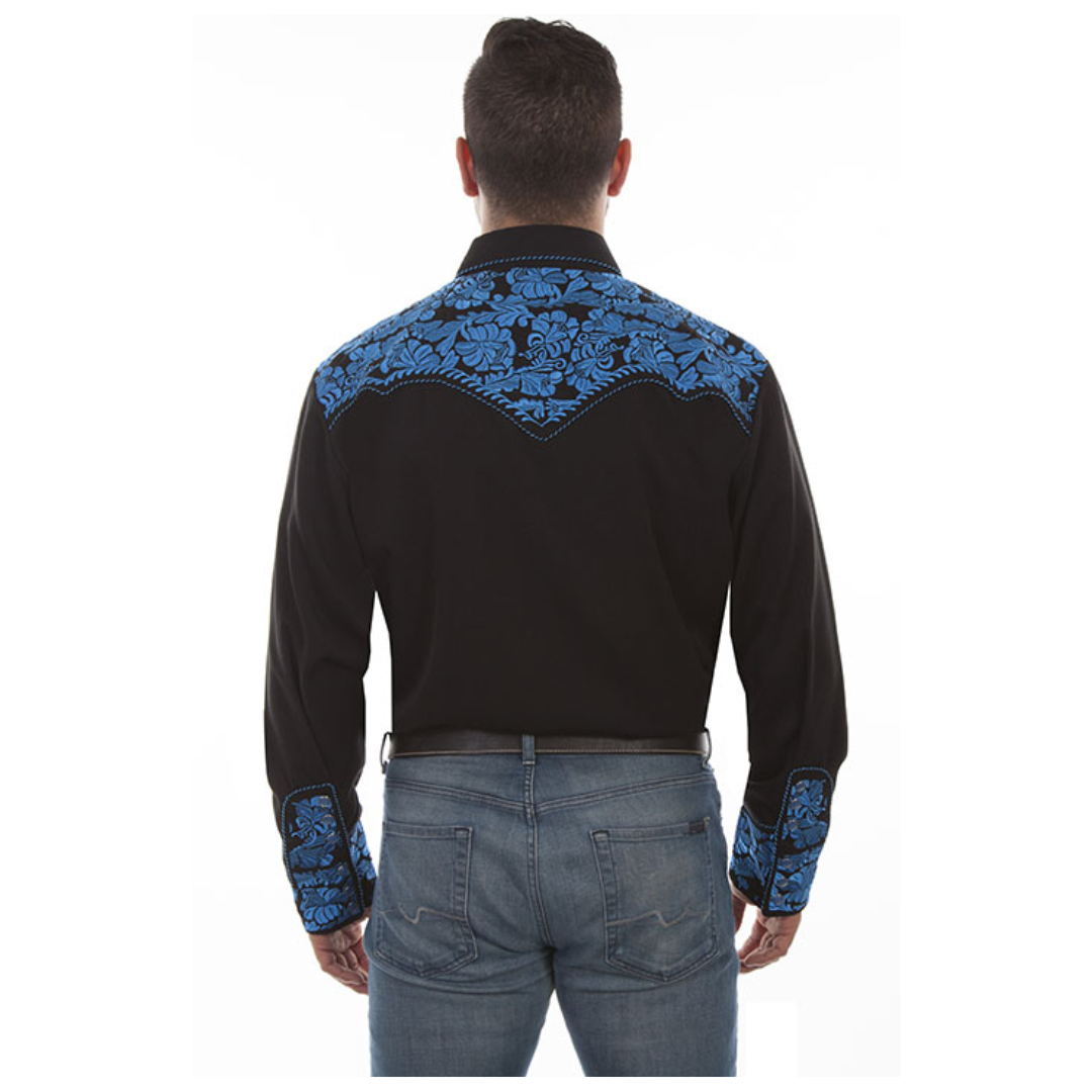 Back of the blue shirt showing the tooled floral pattern across the shoulders