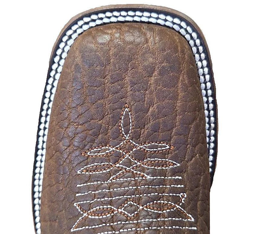Honey bullhide cowboy boot with a rawhide-wrapped heel and spur ledge